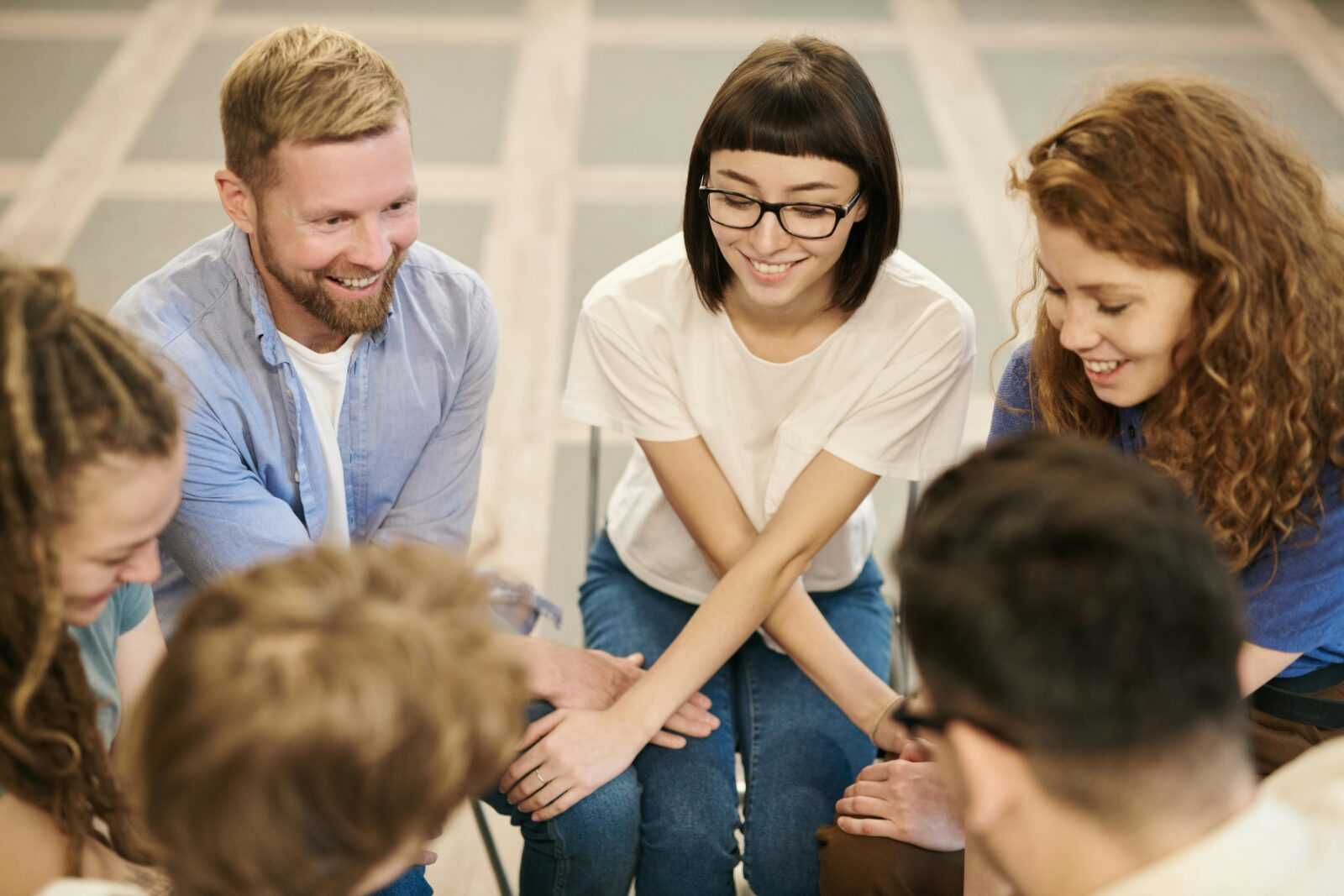 Photo Of People Holding Hands